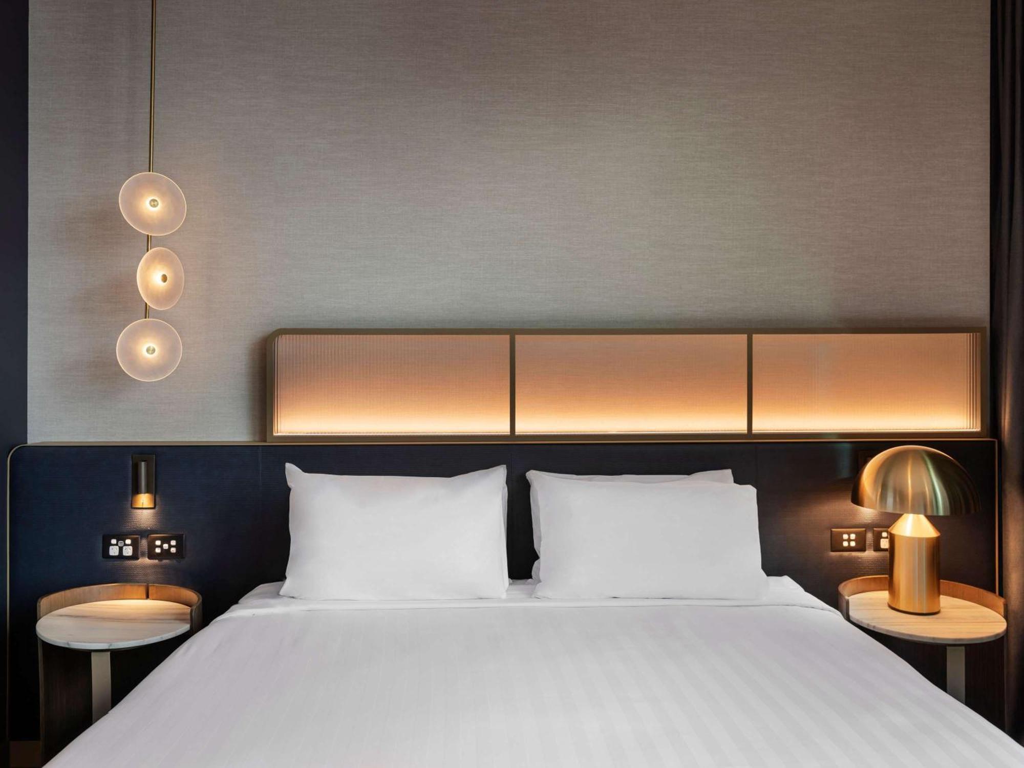 Hotel Pullman Auckland Airport Esterno foto A bedroom at the hotel
